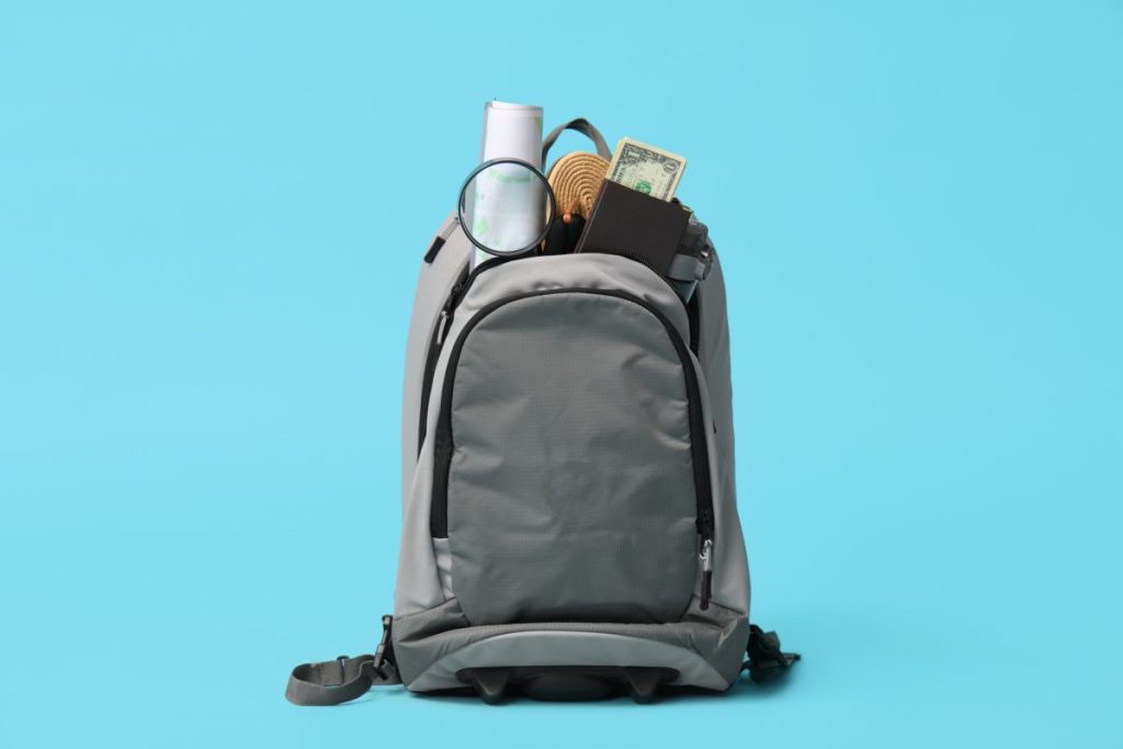 Successfully packed weekend backpack with three days of clothes, toiletries, and shoes organized for carry-on travel