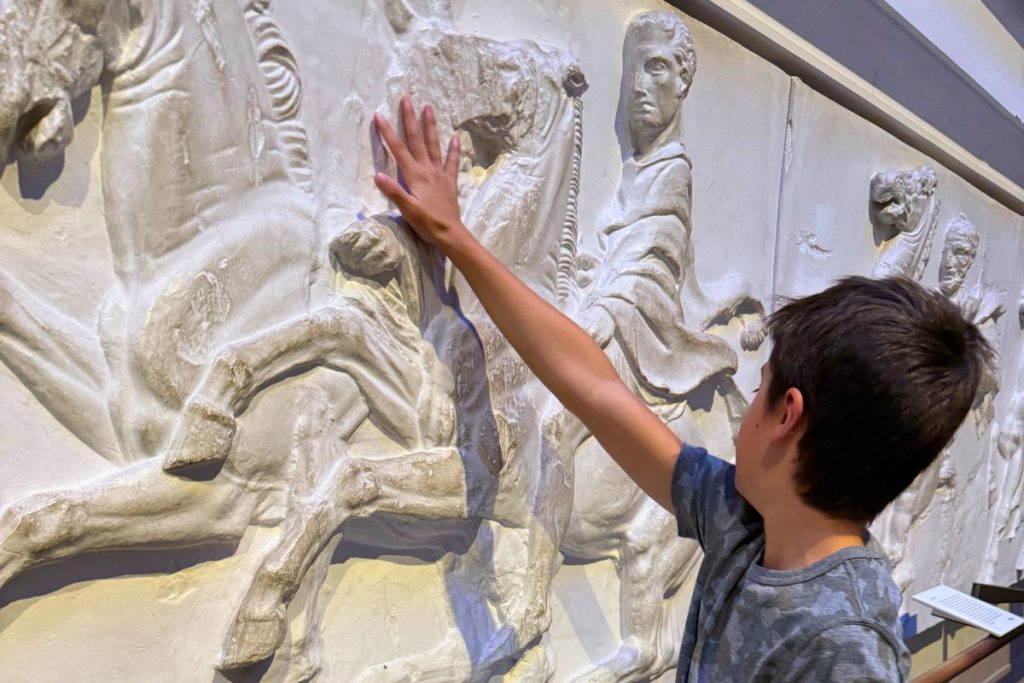 Interactive touchable exhibits at British Museum perfect for kids ages 5-8 visiting London