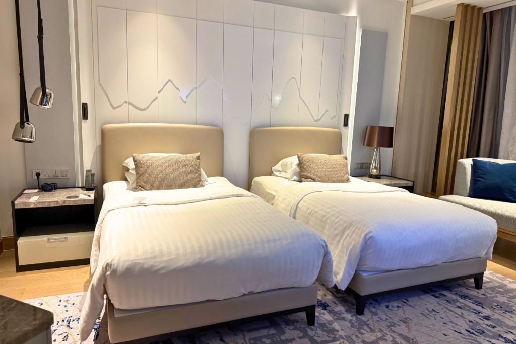 Connecting twin room at the Tirana Marriott with two separate beds and private bathroom