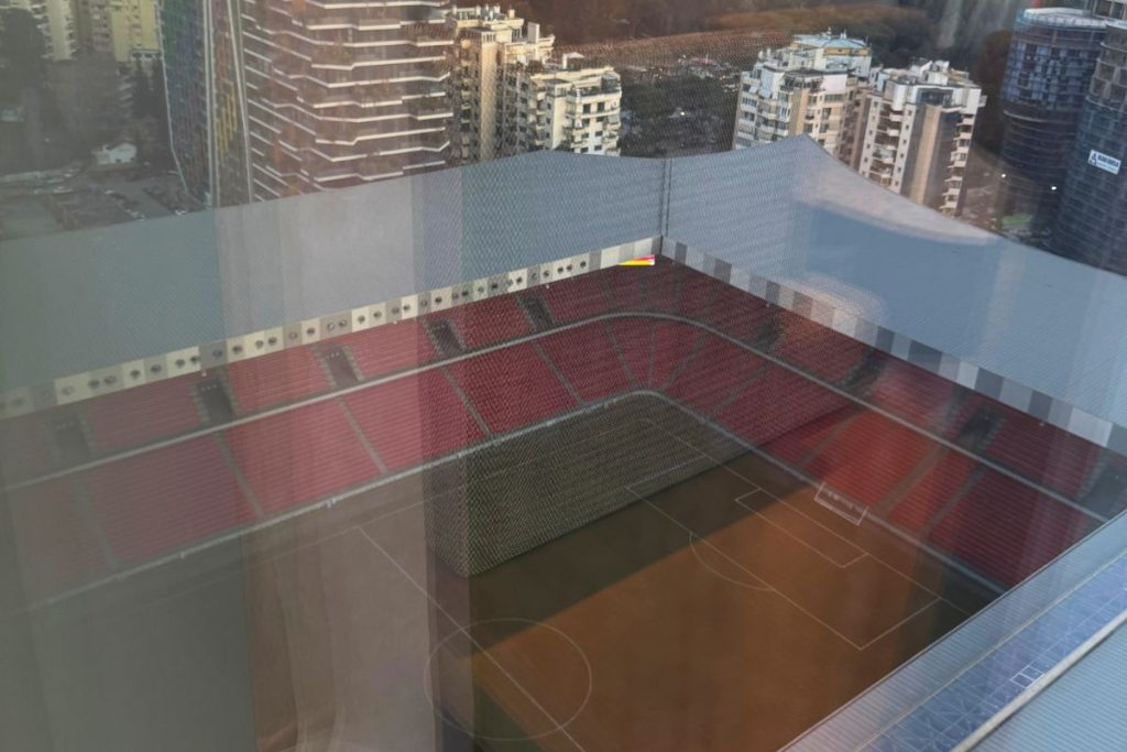 Air Albania Stadium and Tirana city views through floor-to-ceiling windows at the Tirana Marriott Premier Suite